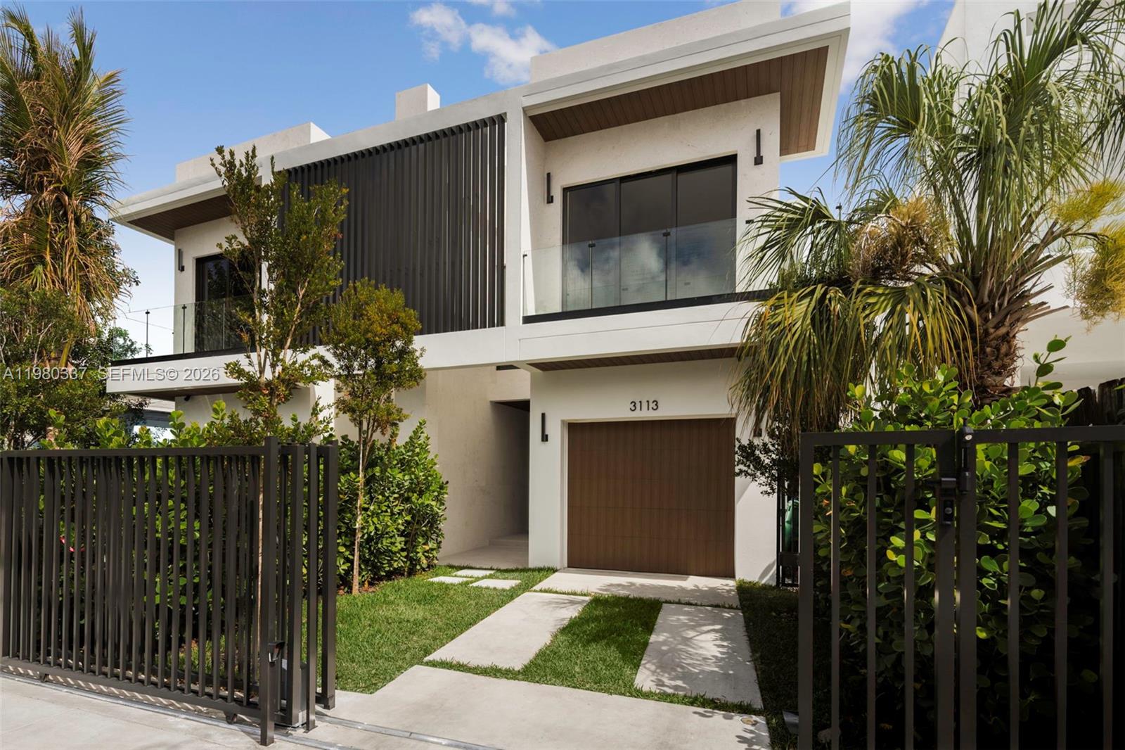 3113 Elizabeth Street Miami, FL 33133 - Photo 2 of 28 a front view of house with yard
