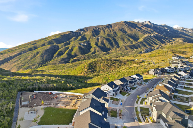 14648 South Springtime Road Draper, UT 84020 - Photo 46 of 47 Expansive mountain landscape bordering a residential development with structured street layouts and new construction properties