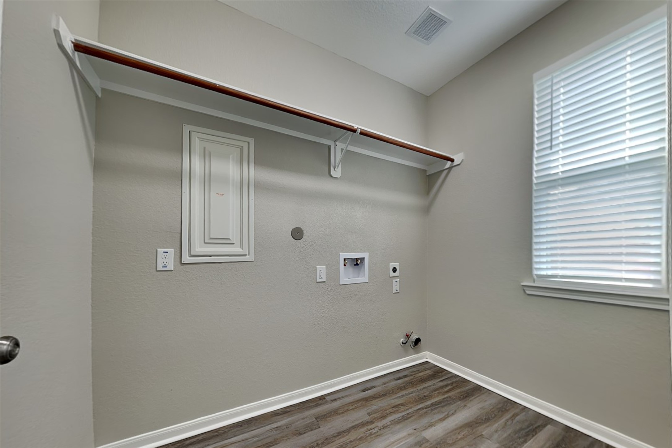9435 Edgeloch Drive Spring, TX 77379 - Photo 16 of 18 a view of room with window and wooden floor