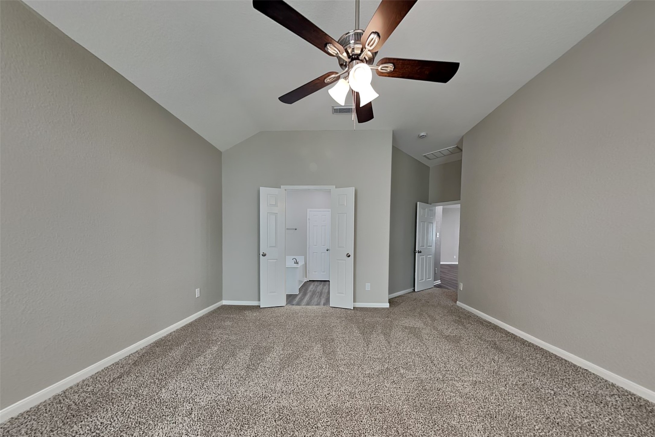 9435 Edgeloch Drive Spring, TX 77379 - Photo 9 of 18 an empty room with chandelier fan