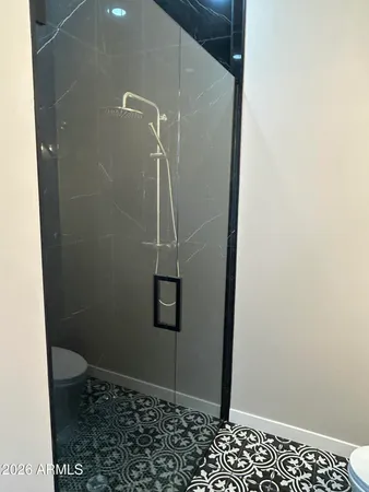 a bathroom with a toilet