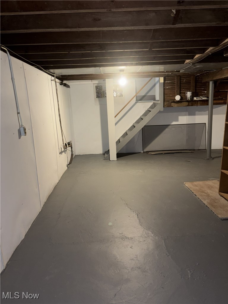 1019 Quilliams Road Cleveland Heights, OH 44121 - Photo 28 of 32 Unfinished below grade area featuring stairs