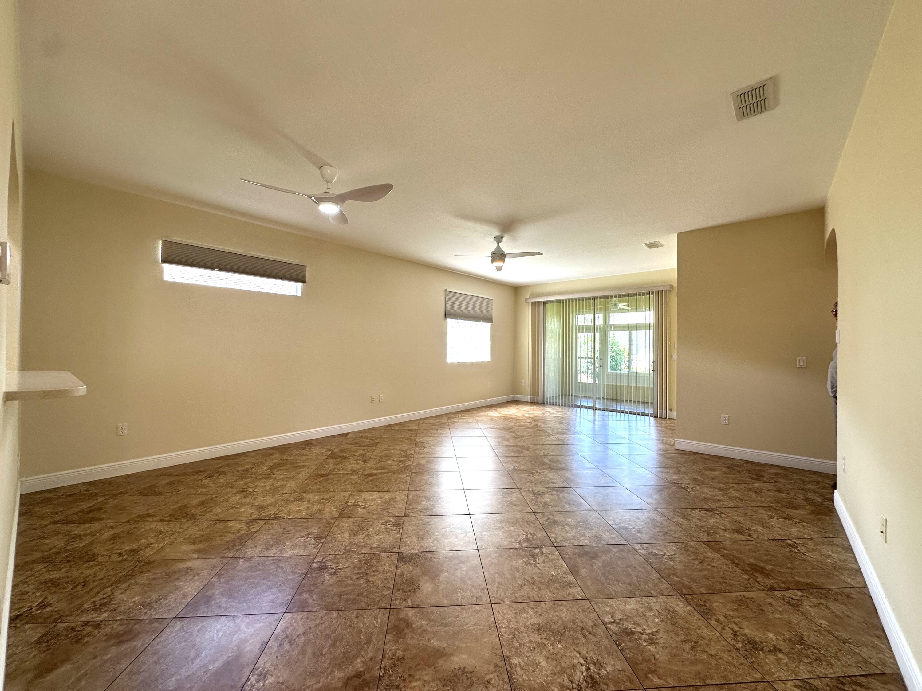 8394 Southwest 82nd Loop Ocala, FL 34481 - Photo 2 of 97 Open concept living/dining area