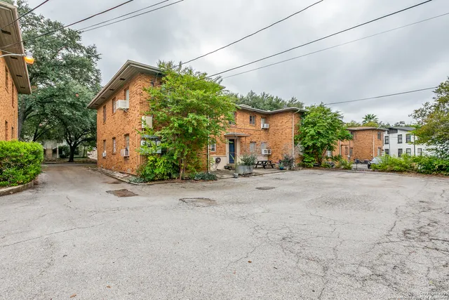 a view of a house with a street