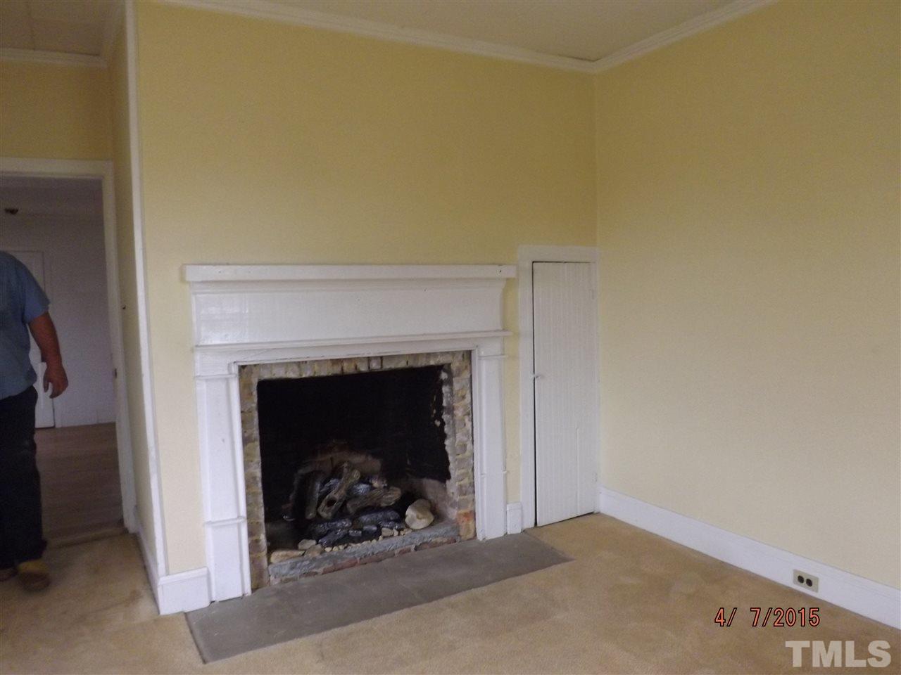 6119 Foushee Road Ramseur, NC 27316 - Photo 11 of 16 a living room with a fireplace