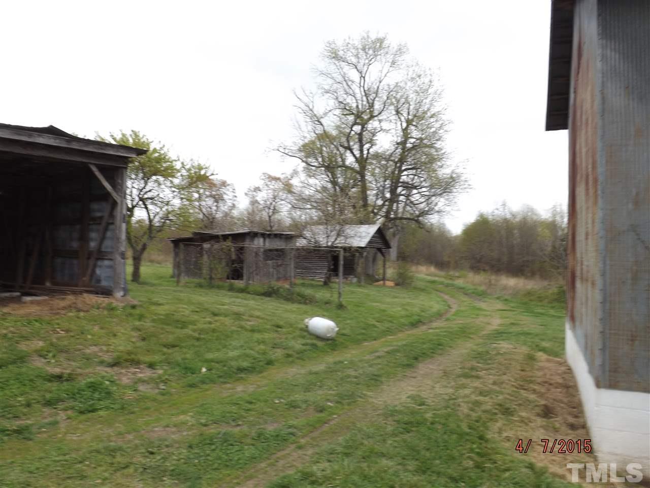 6119 Foushee Road Ramseur, NC 27316 - Photo 16 of 16 a backyard of a house