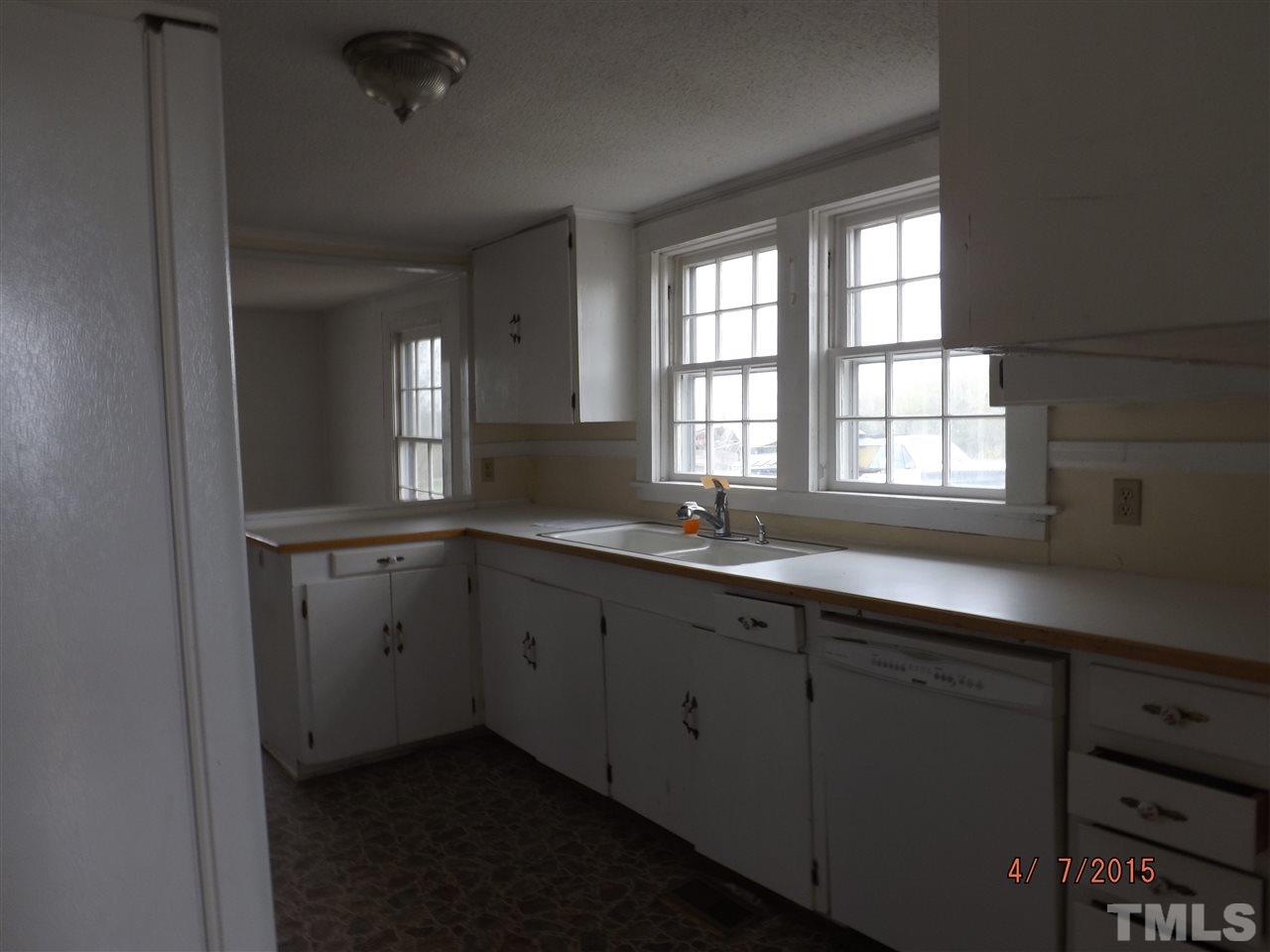 6119 Foushee Road Ramseur, NC 27316 - Photo 5 of 16 a kitchen with sink and window