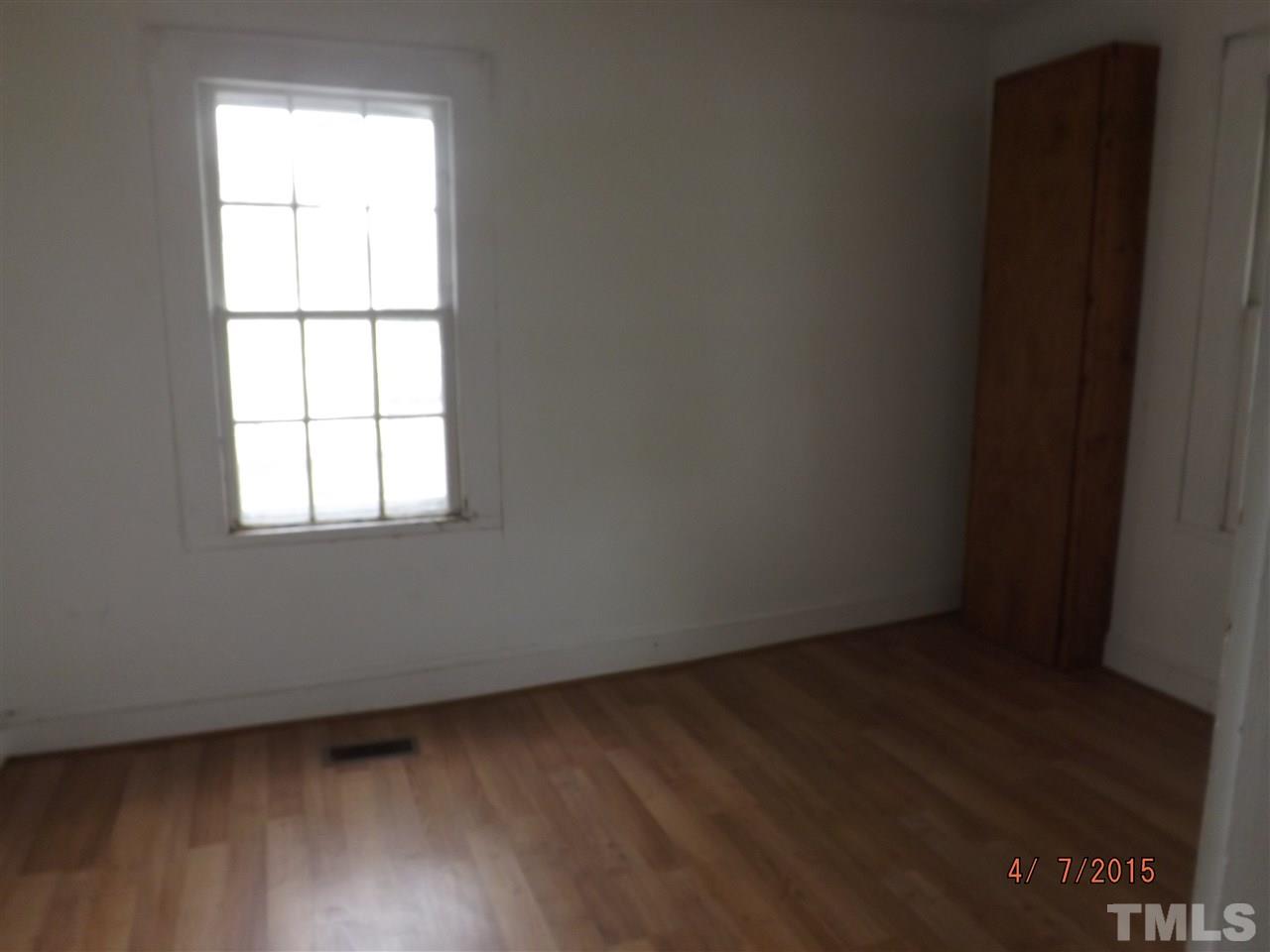 6119 Foushee Road Ramseur, NC 27316 - Photo 8 of 16 an empty room with a window