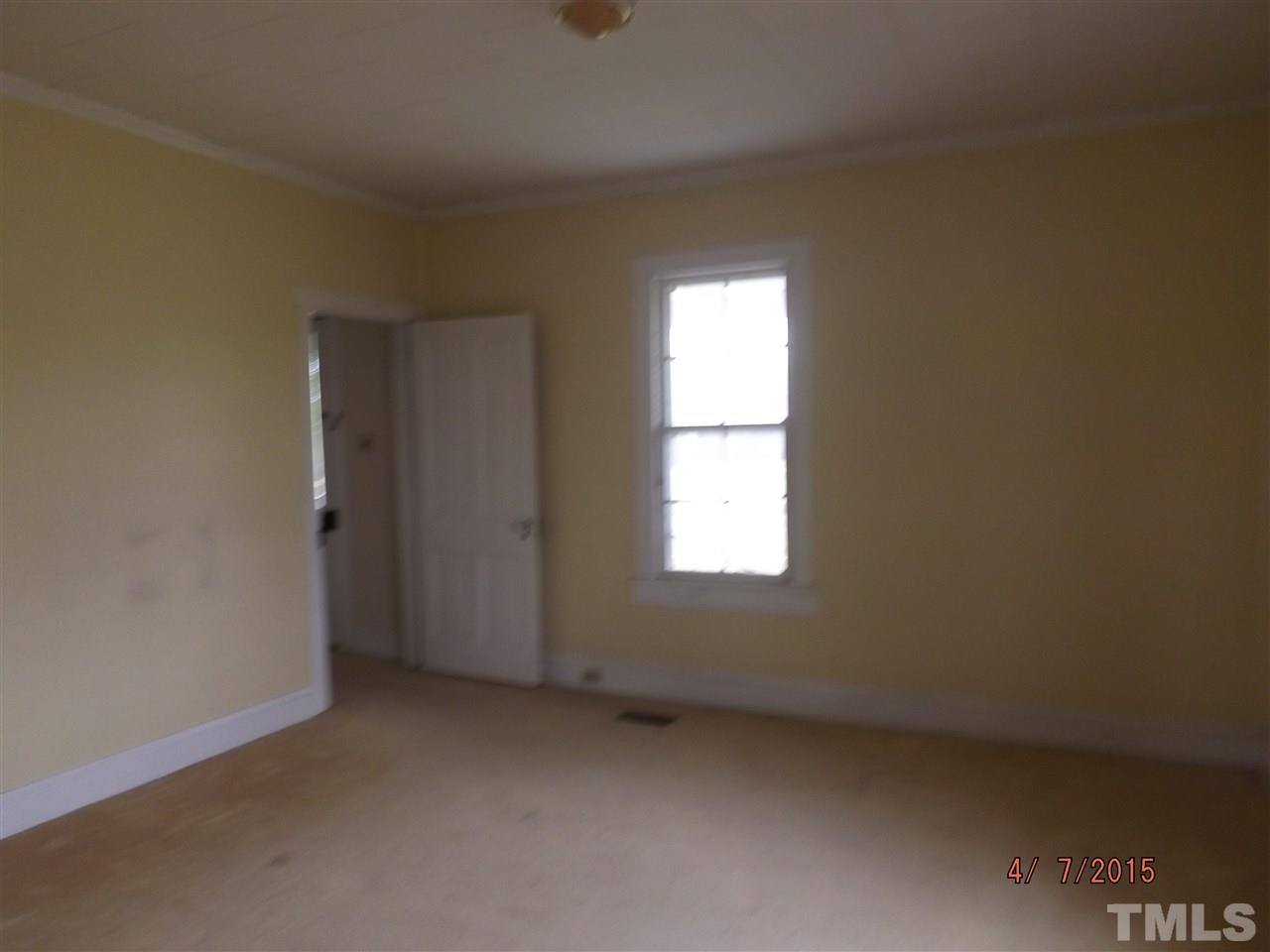 6119 Foushee Road Ramseur, NC 27316 - Photo 10 of 16 an empty room with a window