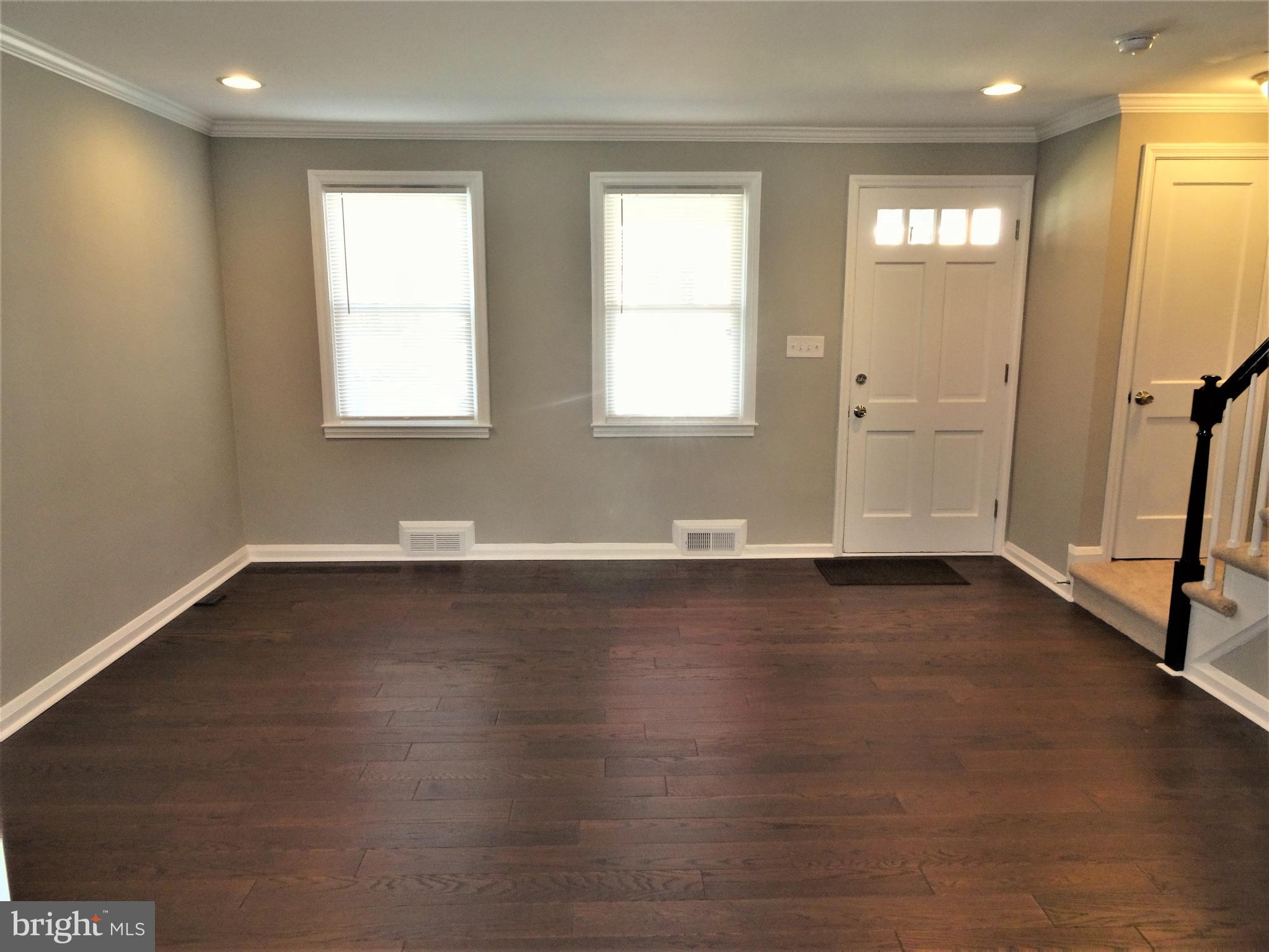 1217 Cedarcroft Road Baltimore, MD 21239 - Photo 11 of 46 Large living room with good natural light