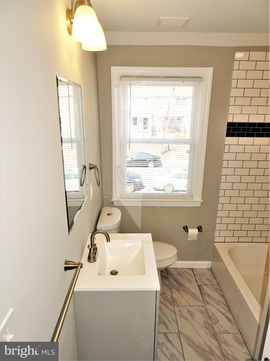 1217 Cedarcroft Road Baltimore, MD 21239 - Photo 15 of 46 Upgraded 2nd floor bathroom