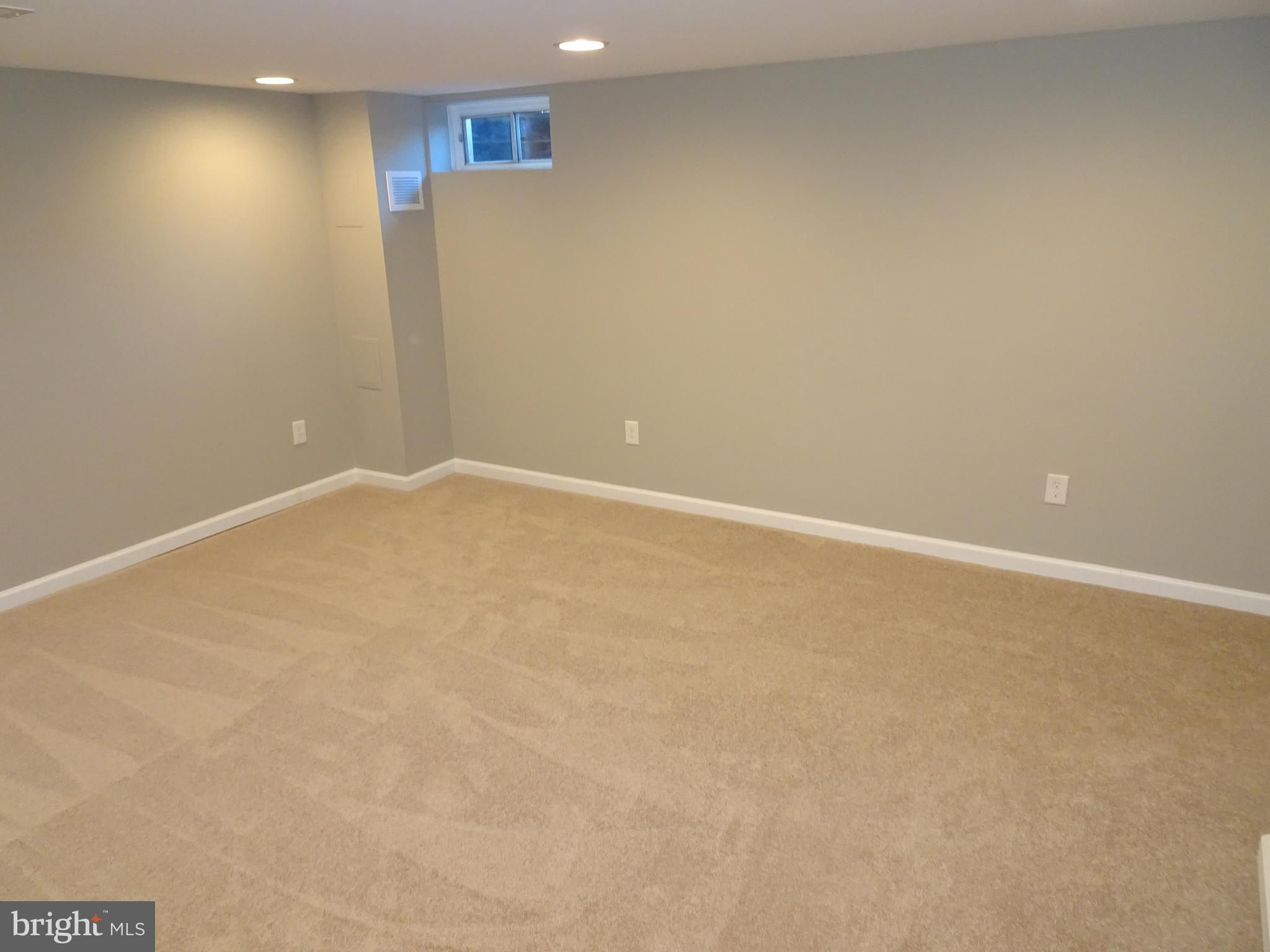 1217 Cedarcroft Road Baltimore, MD 21239 - Photo 31 of 46 Family room recessed lighting