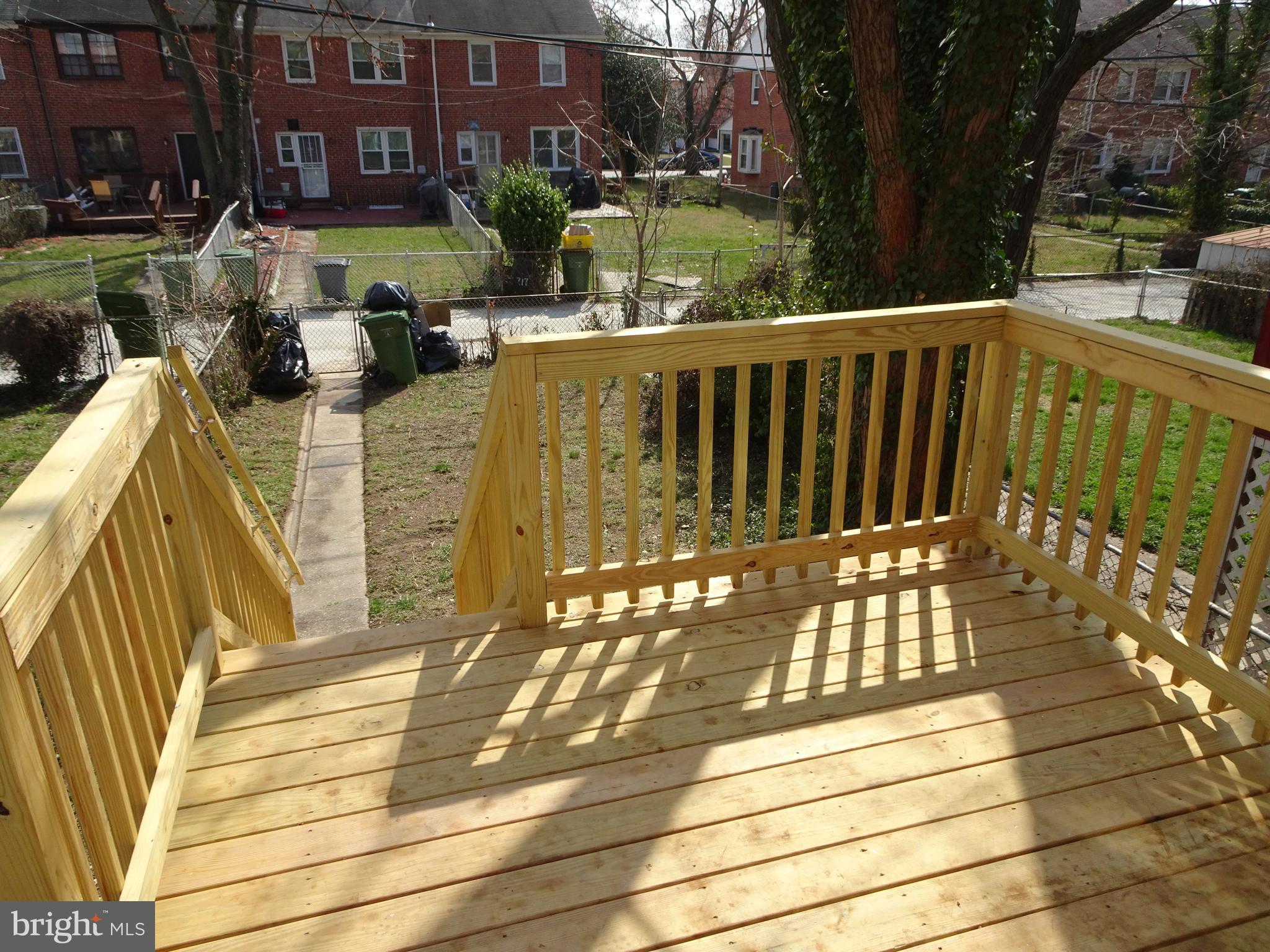 1217 Cedarcroft Road Baltimore, MD 21239 - Photo 38 of 46 Deck access to rear yard