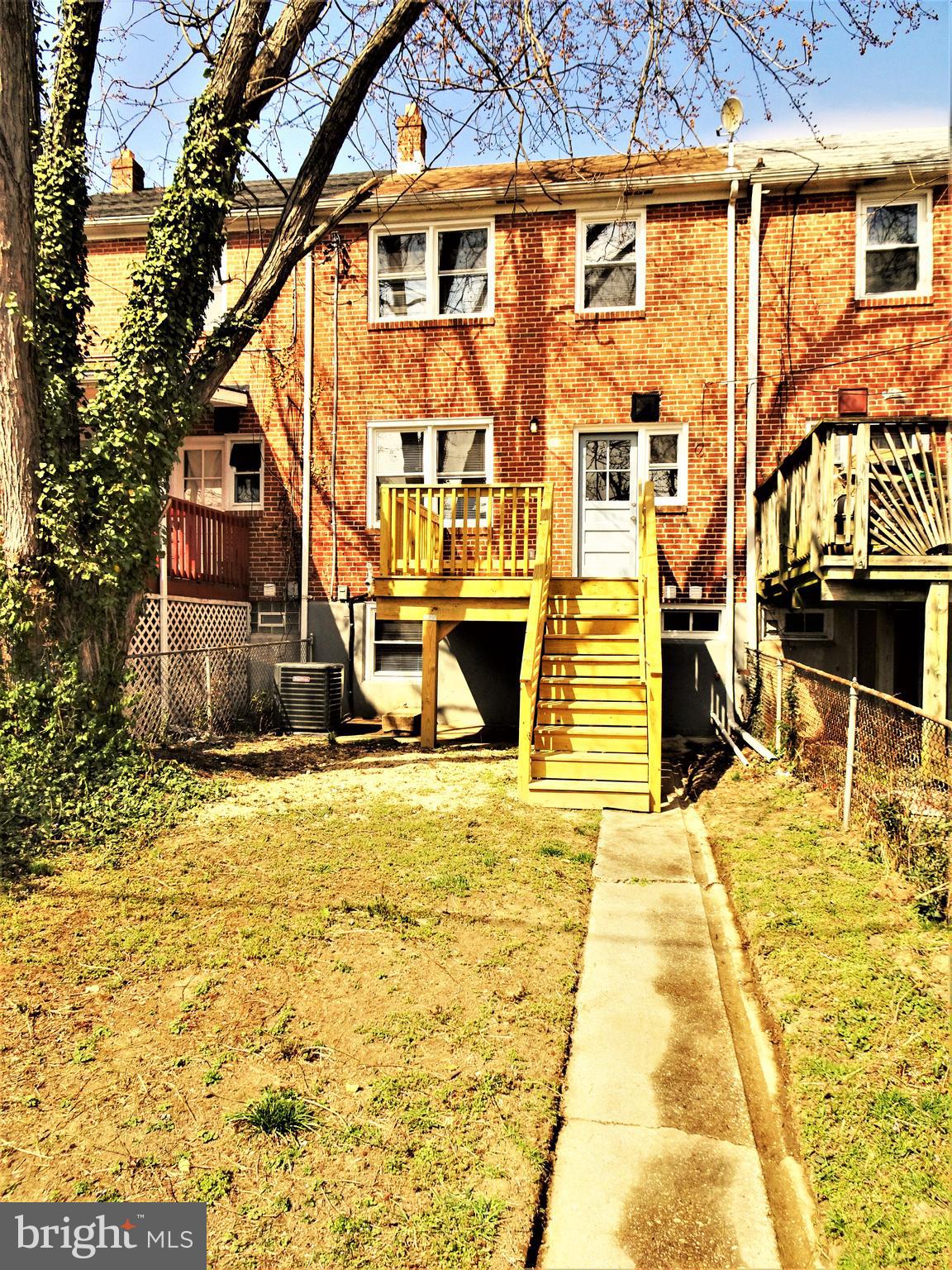 1217 Cedarcroft Road Baltimore, MD 21239 - Photo 40 of 46 Level fenced rear yard - nice alley in rear