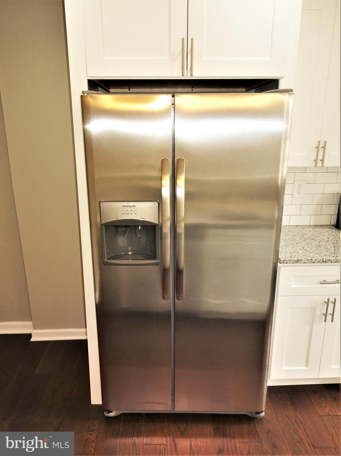 1217 Cedarcroft Road Baltimore, MD 21239 - Photo 8 of 46 Stainless steel fridge with ice and water dispense