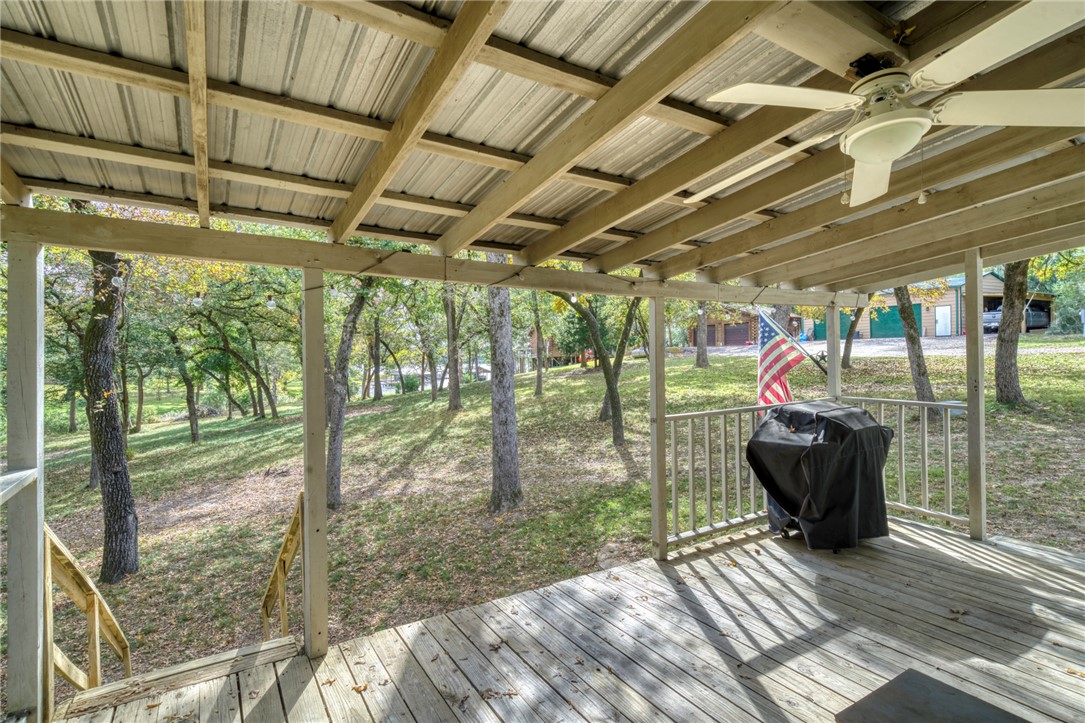 10232 Riley Green Road Franklin, TX 77856 - Photo 24 of 40 a view of a porch with furniture and garden