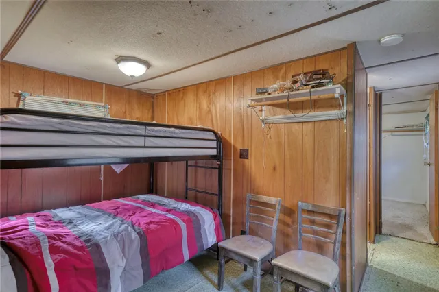 a bathroom with a sink toilet and a mirror