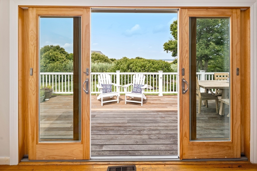 324 Hatherly Road Scituate, MA 02066 - Photo 6 of 15 a view of a living room and window