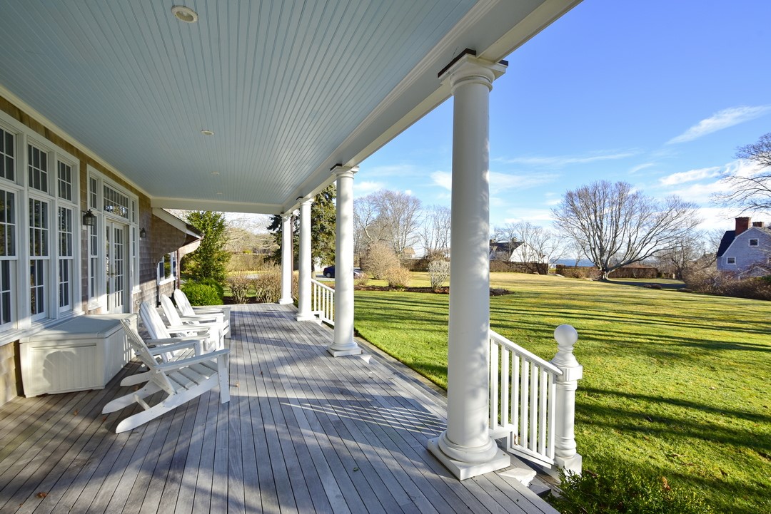 430 Ocean Road Narragansett, RI 02882 - Photo 4 of 43 The covered porch is a great spot for reading, relaxing, and enjoying the views.