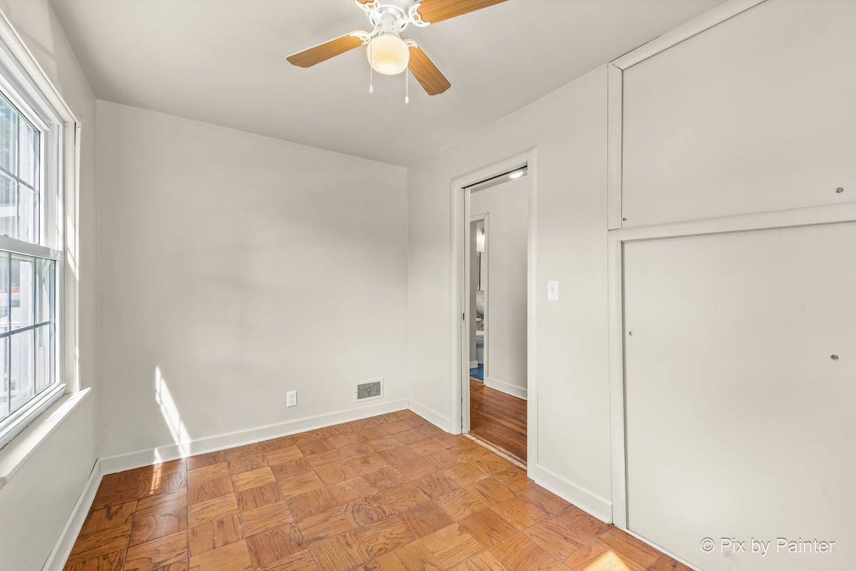 656 Ford Avenue Elgin, IL 60120 - Photo 11 of 18 a view of an empty room with a window