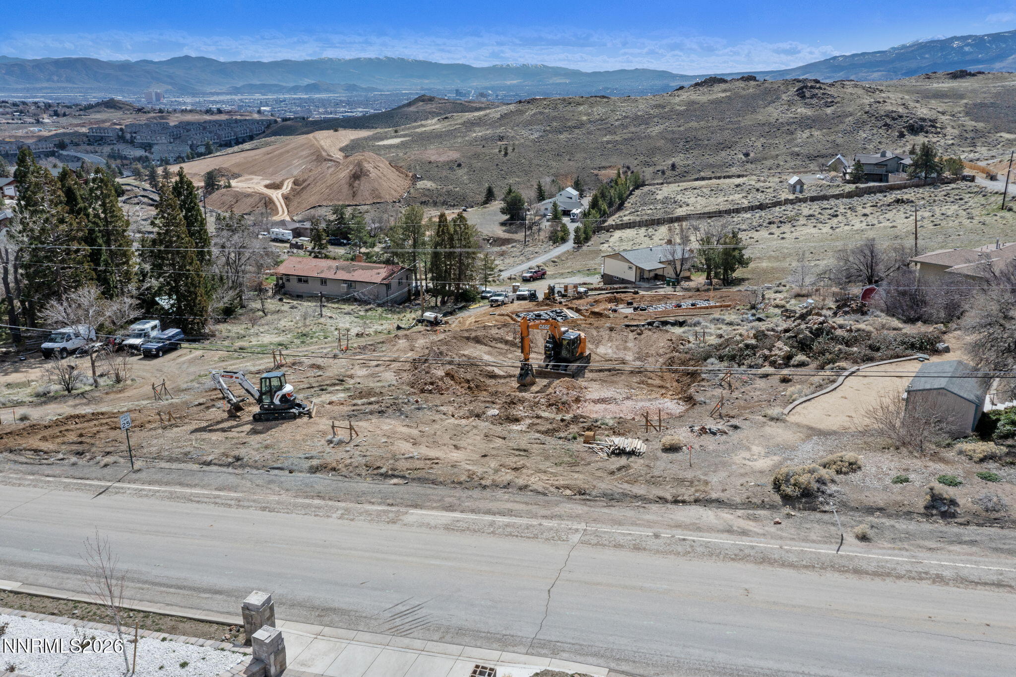 620 Hoge Road Reno, NV 89506 - Photo 17 of 19 an aerial view of a house with a yard and mountain view