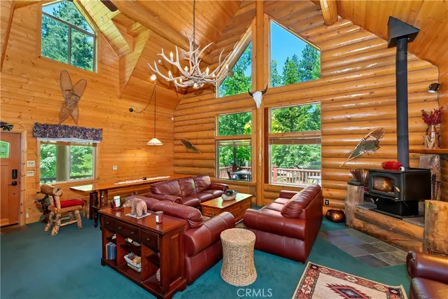 a outdoor living space with furniture and a fireplace