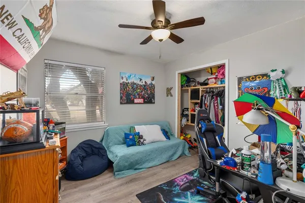 a living room with furniture and a window