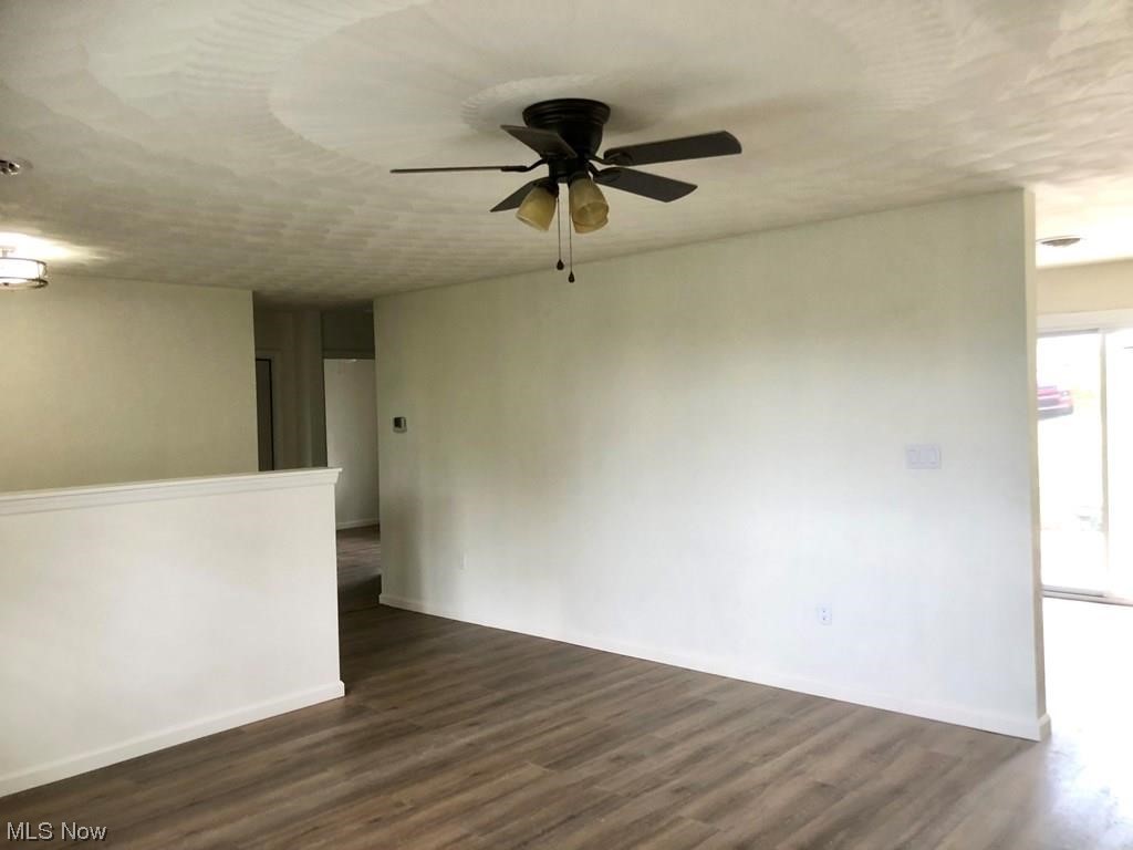 756 Northview Road Wellsburg, WV 26070 - Photo 3 of 25 Empty room featuring light hardwood floors and ceiling fan