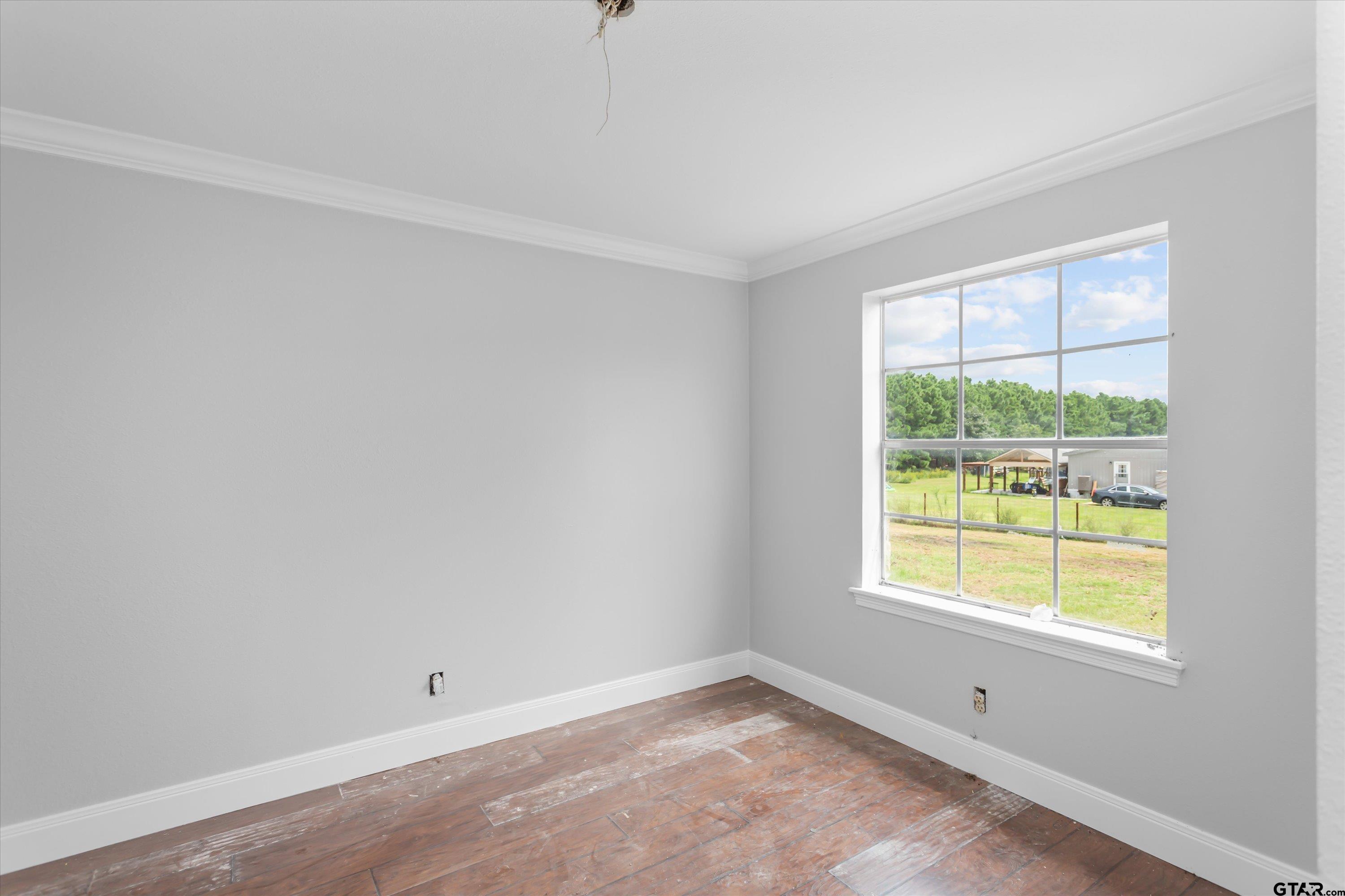 9374 Cedarvale Drive Tyler, TX 75708 - Photo 11 of 20 a view of an empty room with a window