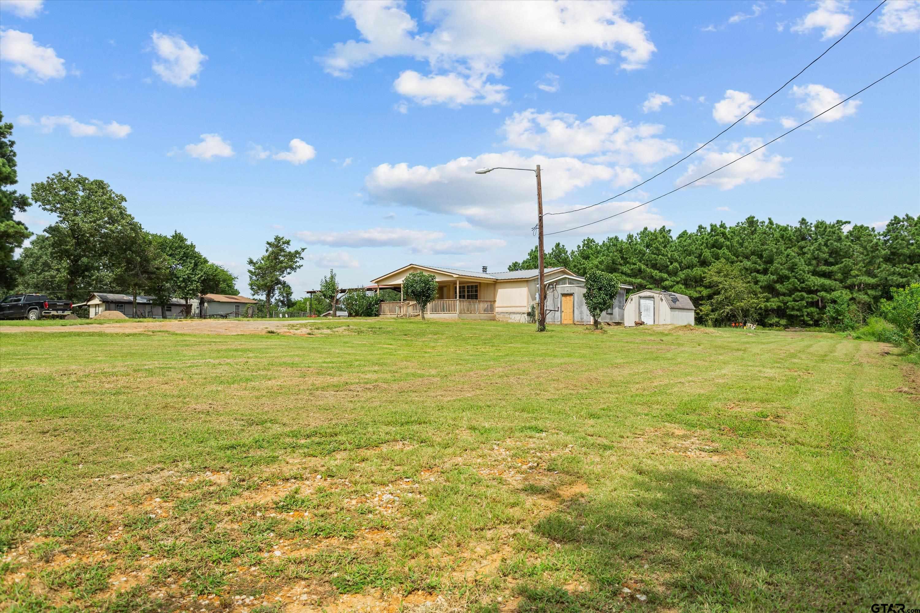 9374 Cedarvale Drive Tyler, TX 75708 - Photo 3 of 20 a view of a water with an outdoor space