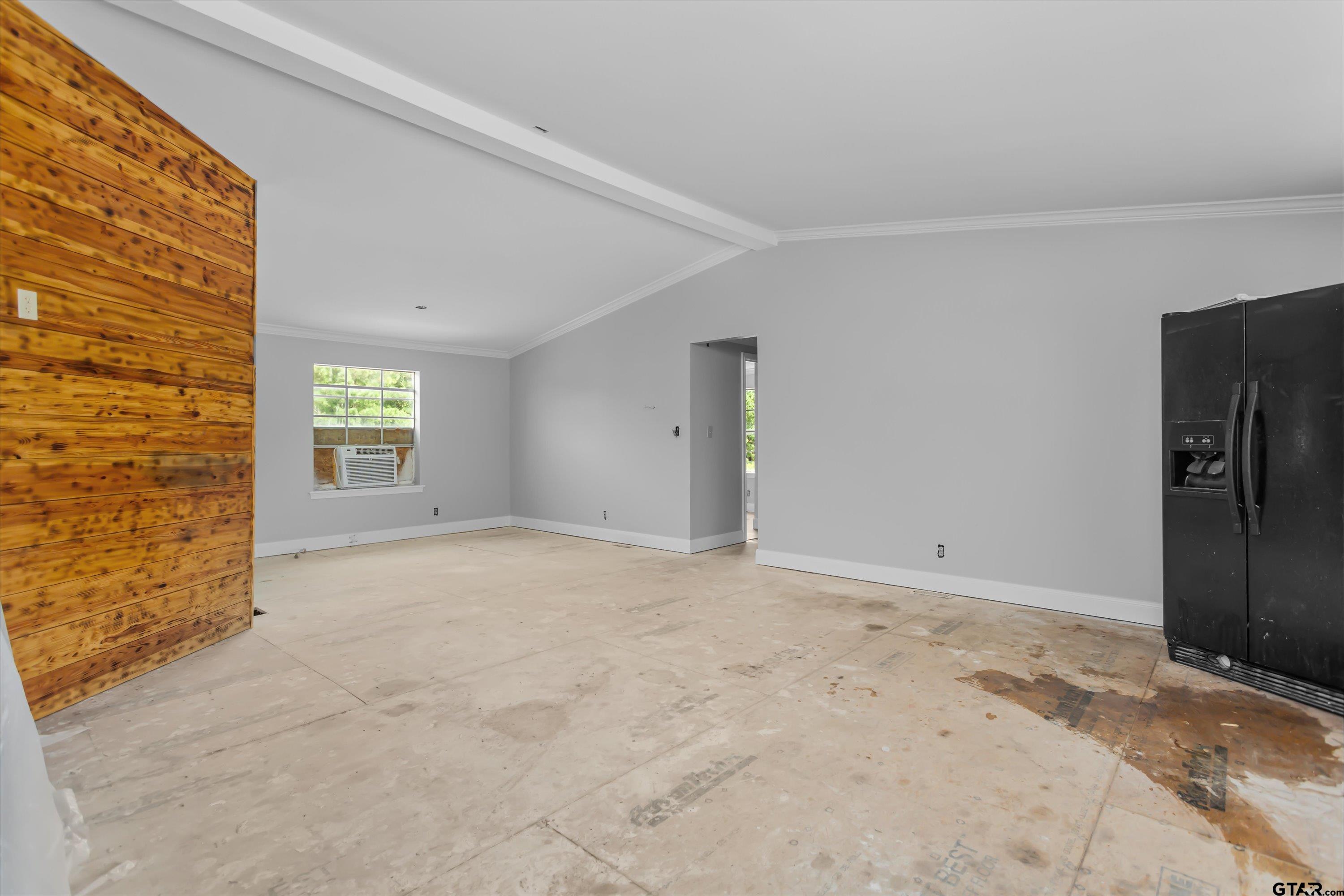 9374 Cedarvale Drive Tyler, TX 75708 - Photo 6 of 20 a view of an empty room with a window