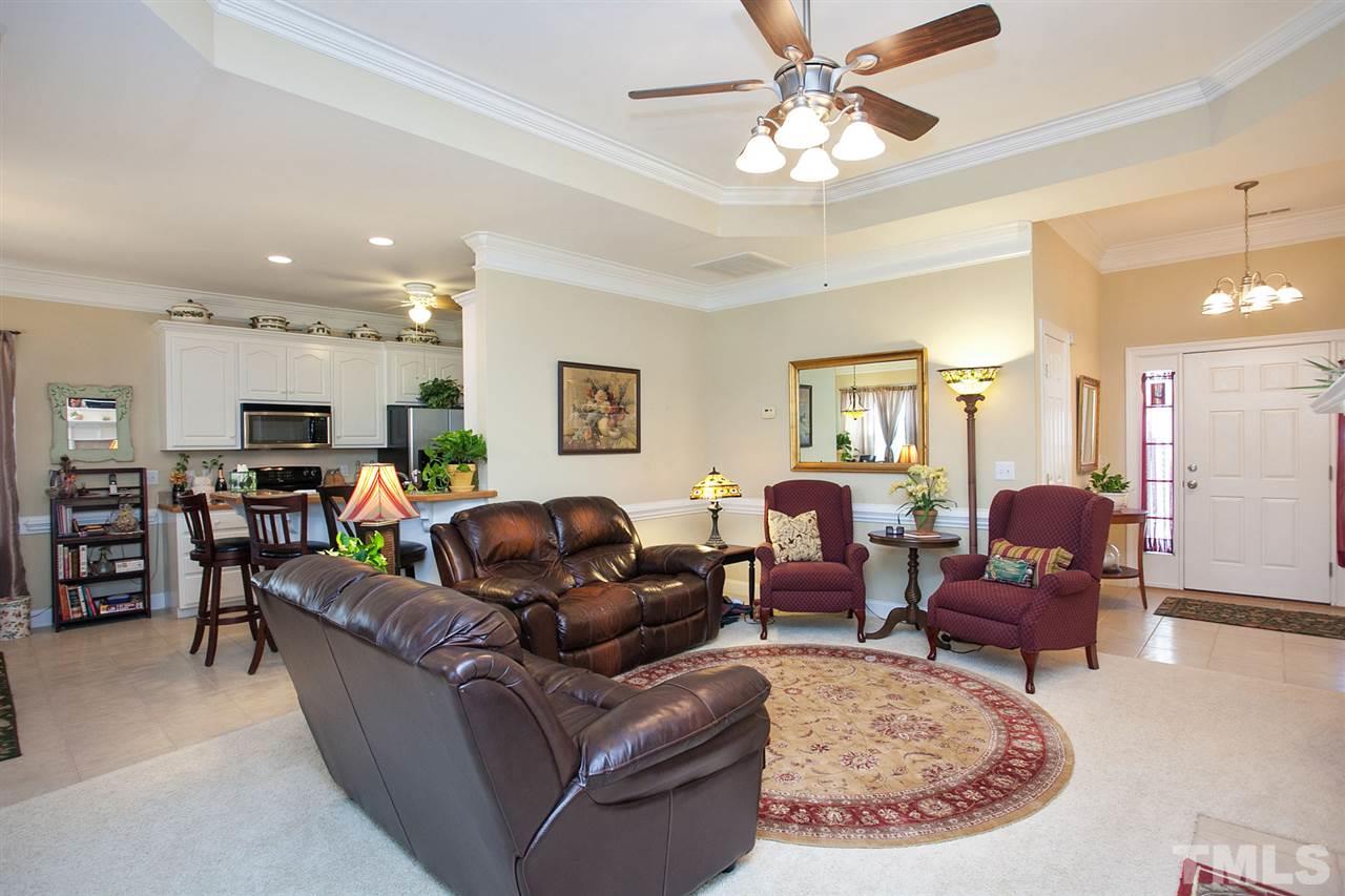 11551 Rockside Road Middlesex, NC 27557 - Photo 17 of 25 a living room with furniture and a chandelier