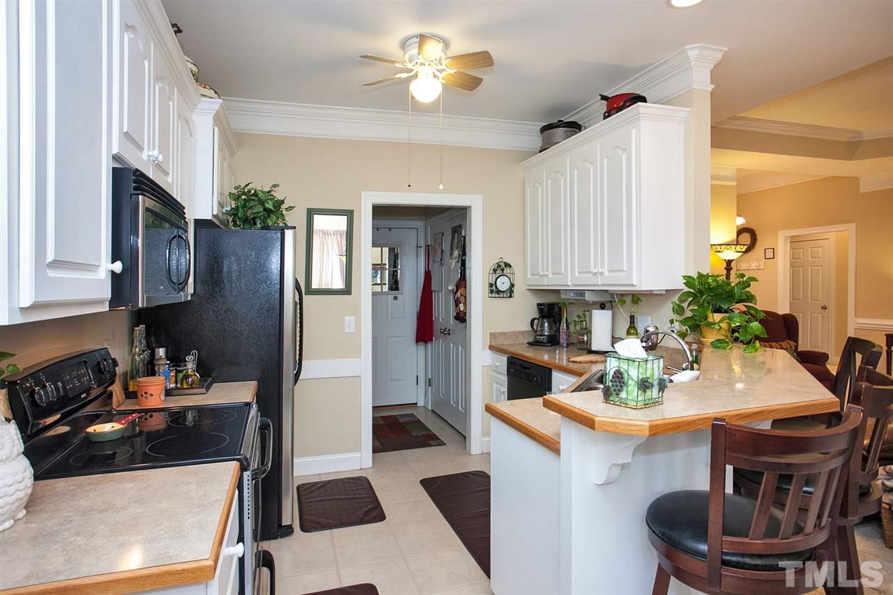 11551 Rockside Road Middlesex, NC 27557 - Photo 18 of 25 a kitchen with a sink appliances and cabinets