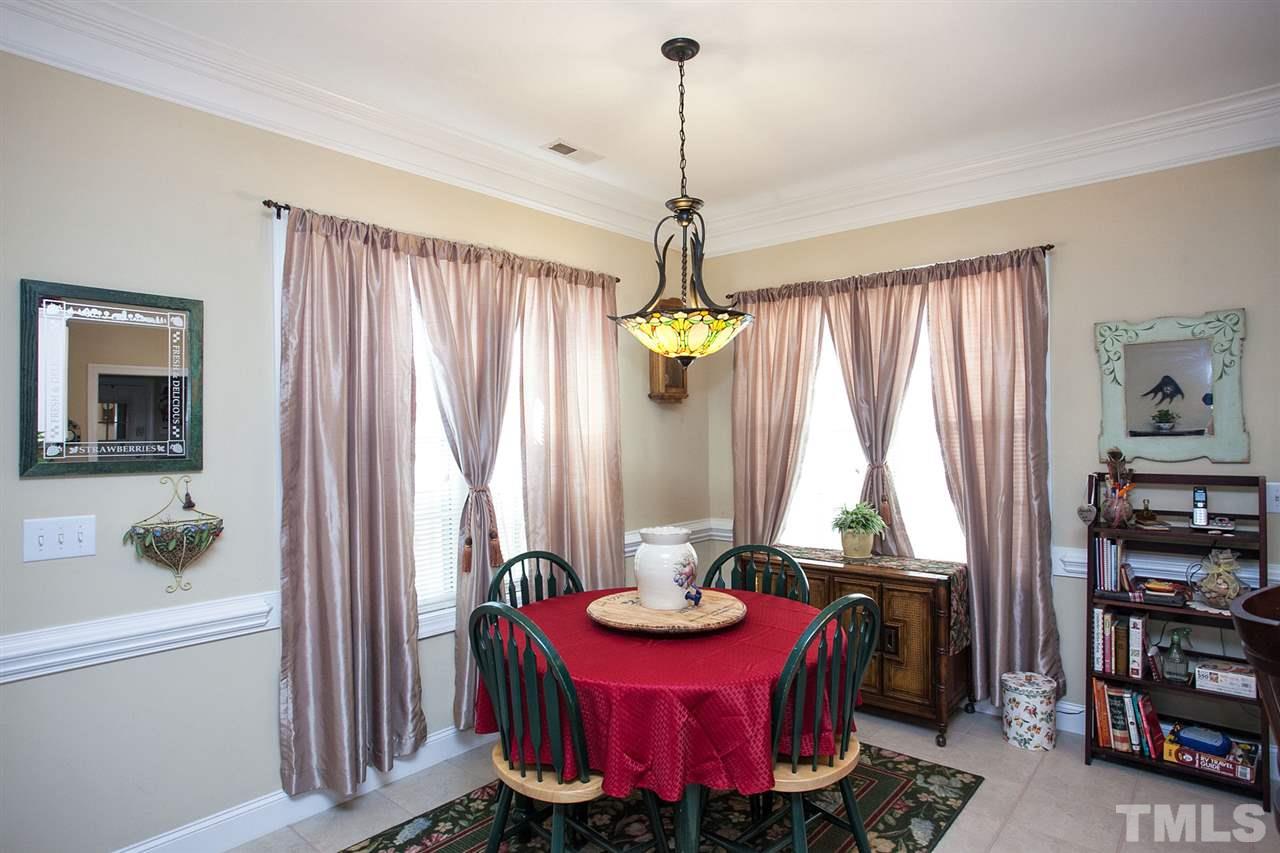 11551 Rockside Road Middlesex, NC 27557 - Photo 22 of 25 a dining room with furniture and window