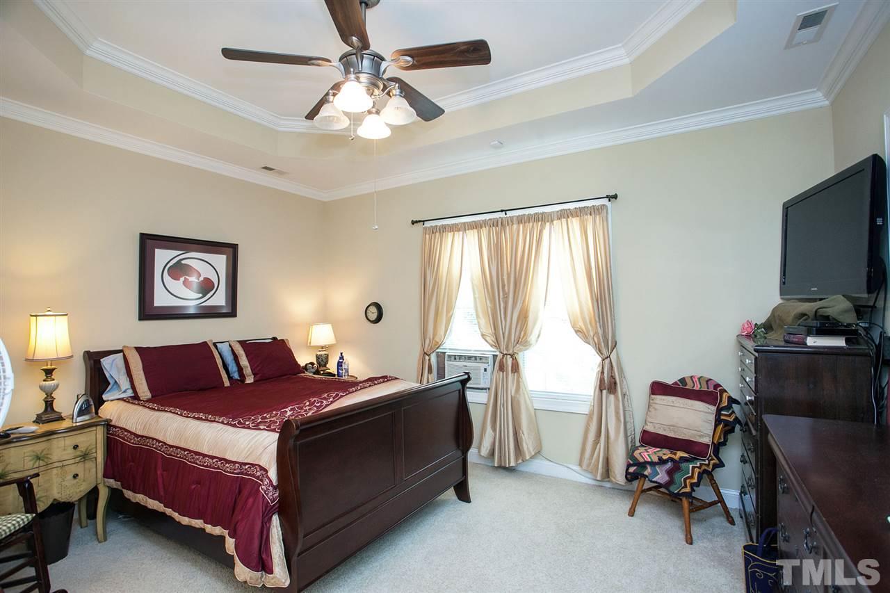 11551 Rockside Road Middlesex, NC 27557 - Photo 7 of 25 a bedroom with a bed and a window