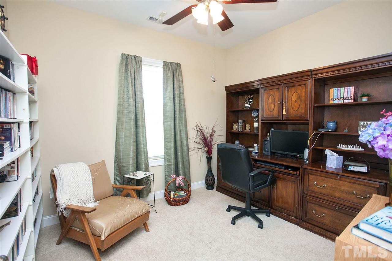 11551 Rockside Road Middlesex, NC 27557 - Photo 9 of 25 a view of a livingroom with workspace and a couch