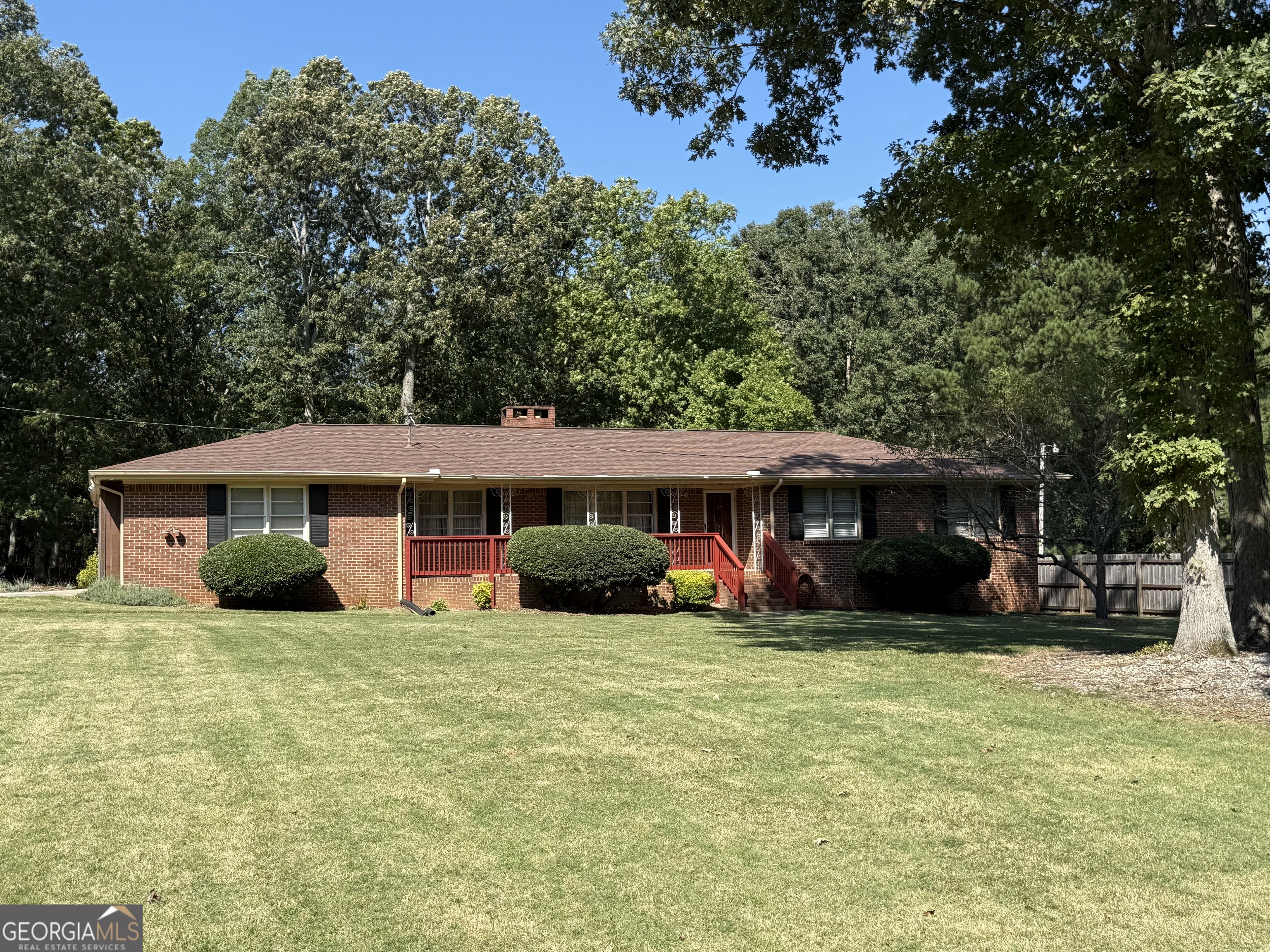 110 Otelia Lane Covington, GA 30014 - Photo 1 of 9 a view of a house with a yard and sitting area