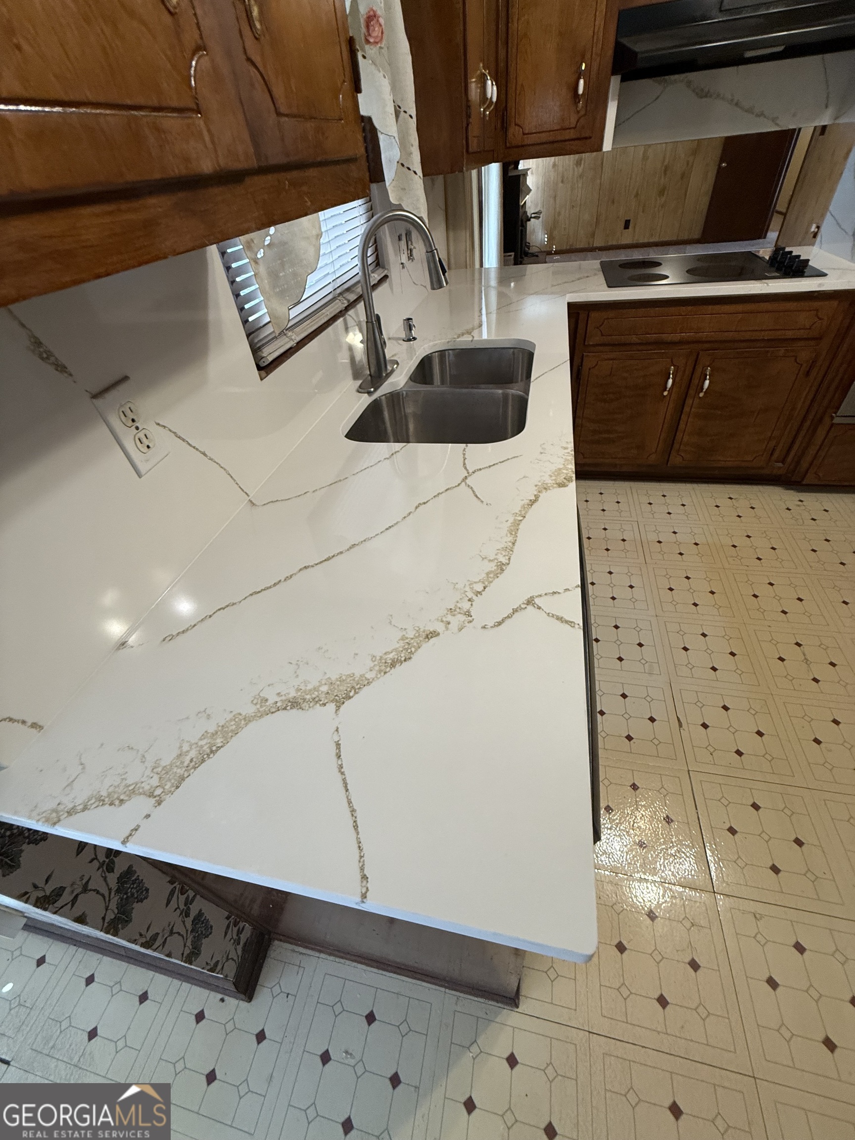 110 Otelia Lane Covington, GA 30014 - Photo 22 of 30 a kitchen with a stove and a refrigerator
