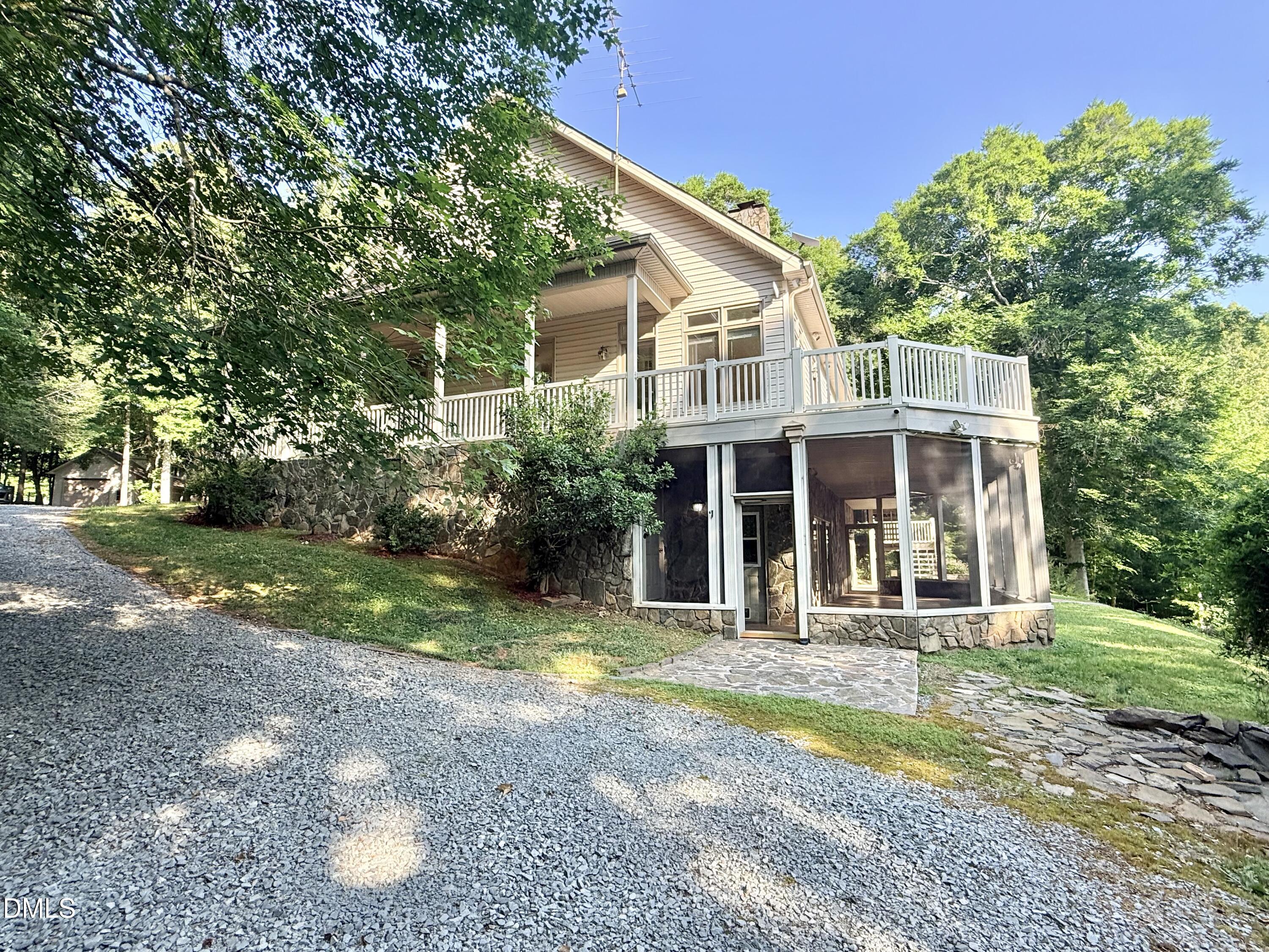 81 Beaver Crossing Road Roxboro, NC 27574 - Photo 57 of 80 a front view of a house with a yard