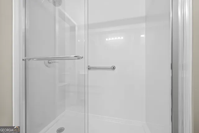 a bathroom with a sink a vanity and a mirror