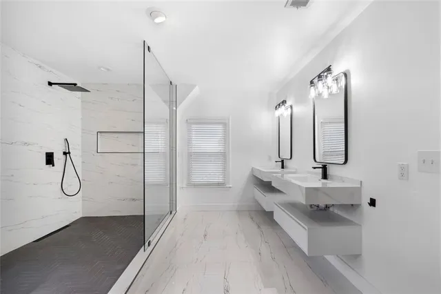 a view of a room with a window and wooden floor