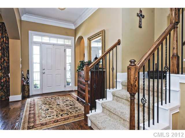 419 Bull Finch Bend Fort Mill, SC 29708 - Photo 2 of 16 a view of an entryway with wooden floor