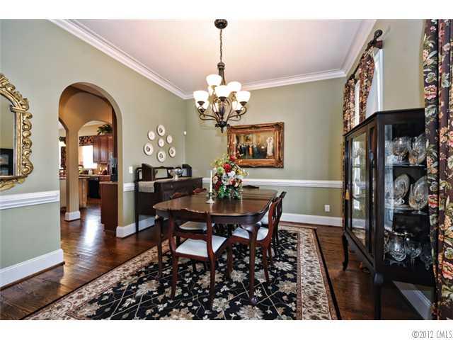 419 Bull Finch Bend Fort Mill, SC 29708 - Photo 3 of 16 a view of a dining room with furniture and chandelier