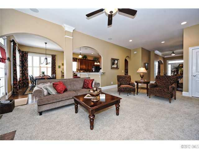 419 Bull Finch Bend Fort Mill, SC 29708 - Photo 4 of 16 a living room with furniture and a large window