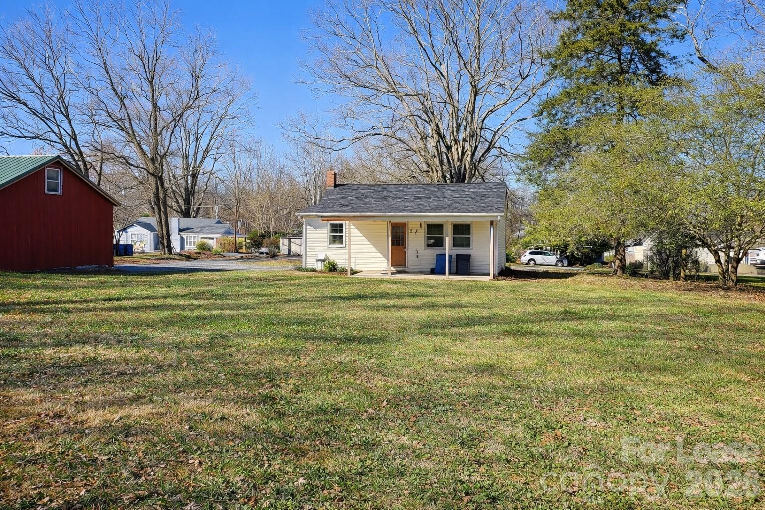 116 Barnes Lane Stony Point, NC 28678 - Photo 21 of 40 a front view of house with yard and green space