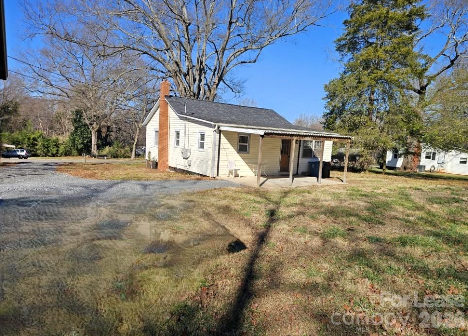 116 Barnes Lane Stony Point, NC 28678 - Photo 22 of 40 a view of a house with a snow in the yard