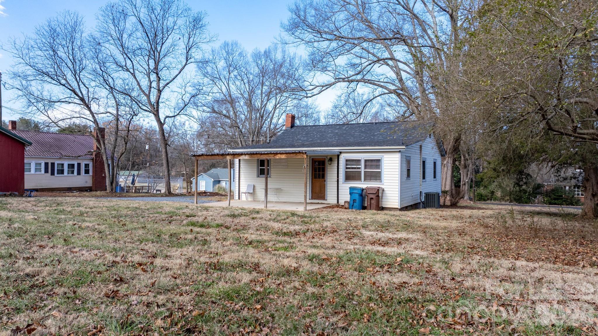 116 Barnes Lane Stony Point, NC 28678 - Photo 36 of 40 a front view of a house with a garden
