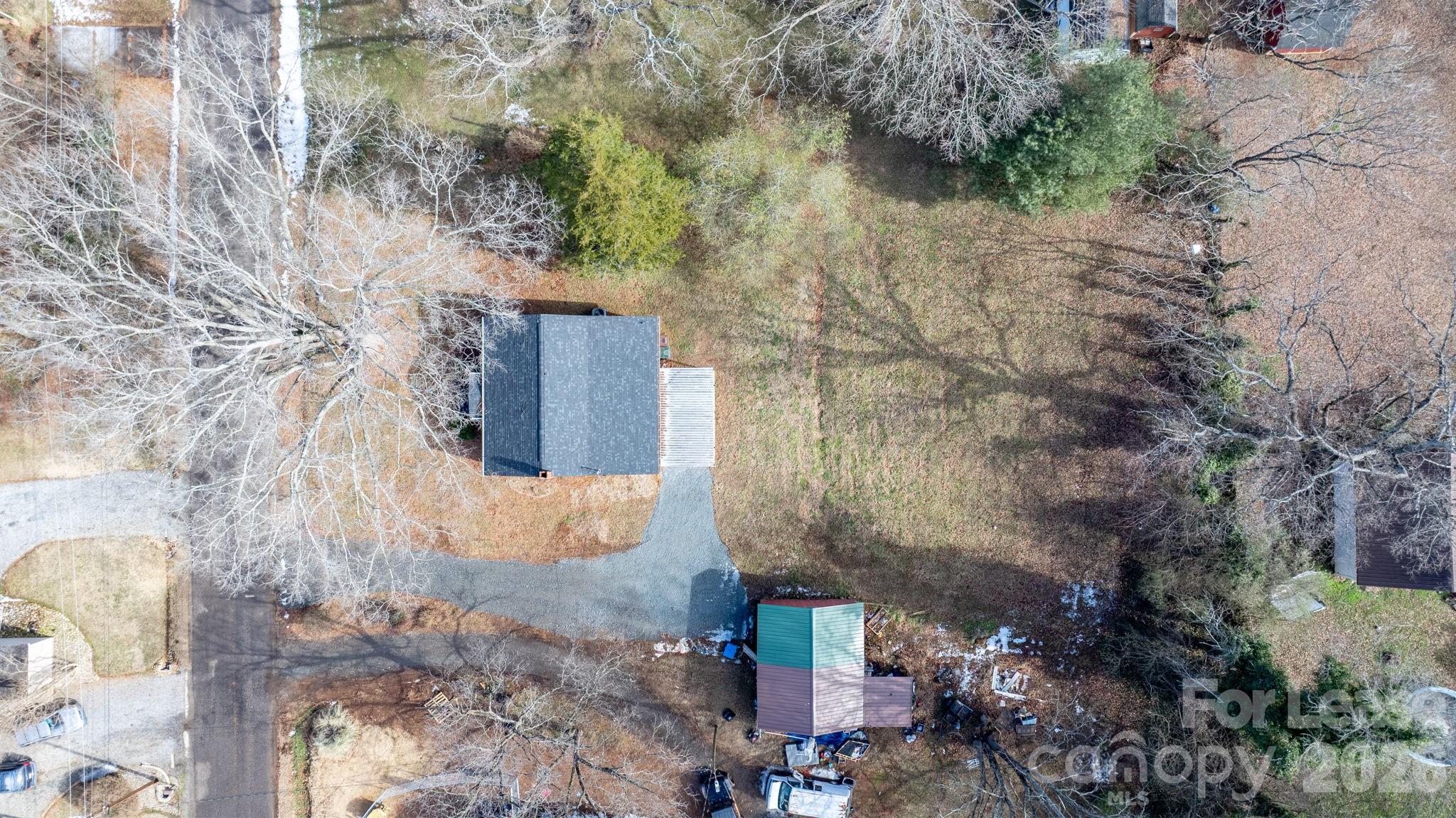 116 Barnes Lane Stony Point, NC 28678 - Photo 39 of 40 a building with trees in front of it