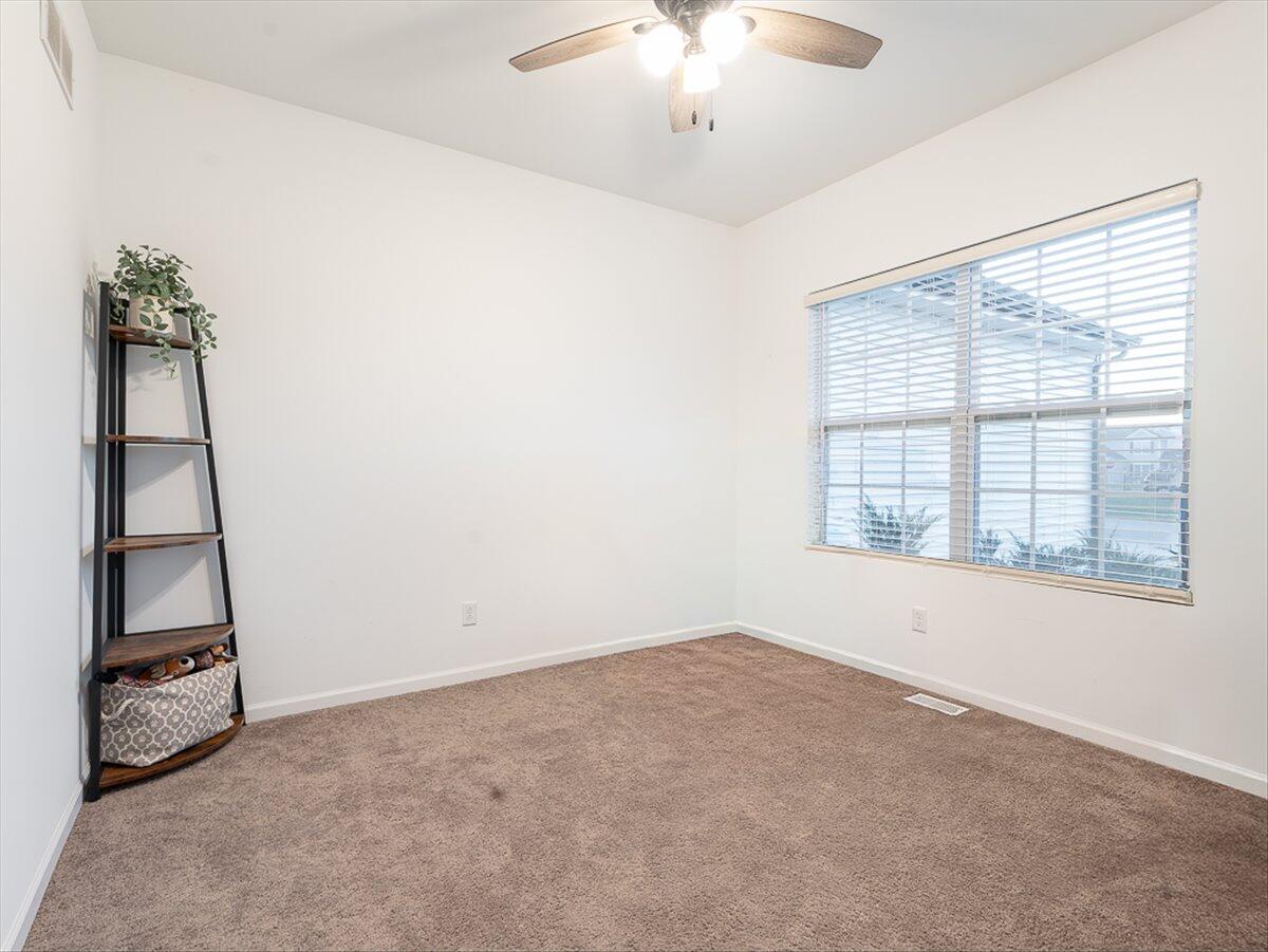10377 Nevada Place Crown Point, IN 46307 - Photo 11 of 21 an empty room with windows and closet