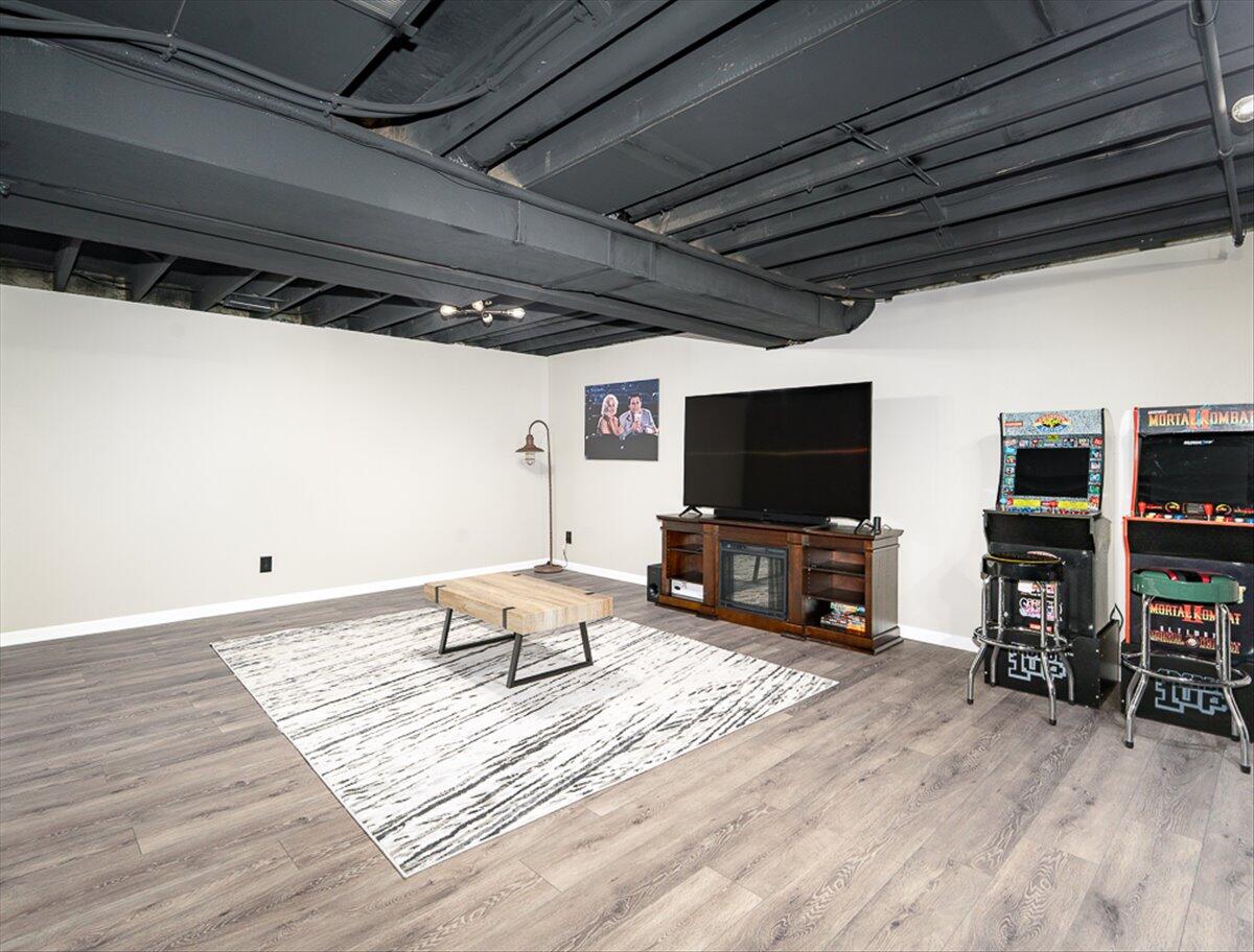 10377 Nevada Place Crown Point, IN 46307 - Photo 18 of 21 a living room with furniture and a flat screen tv